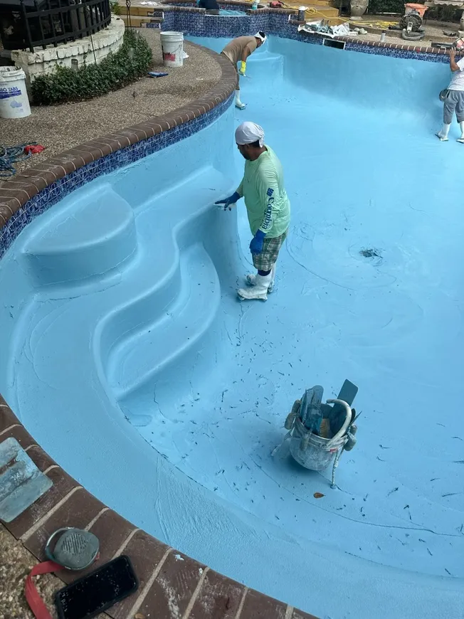 Pool plastering Austin TX — fresh white plaster finish
